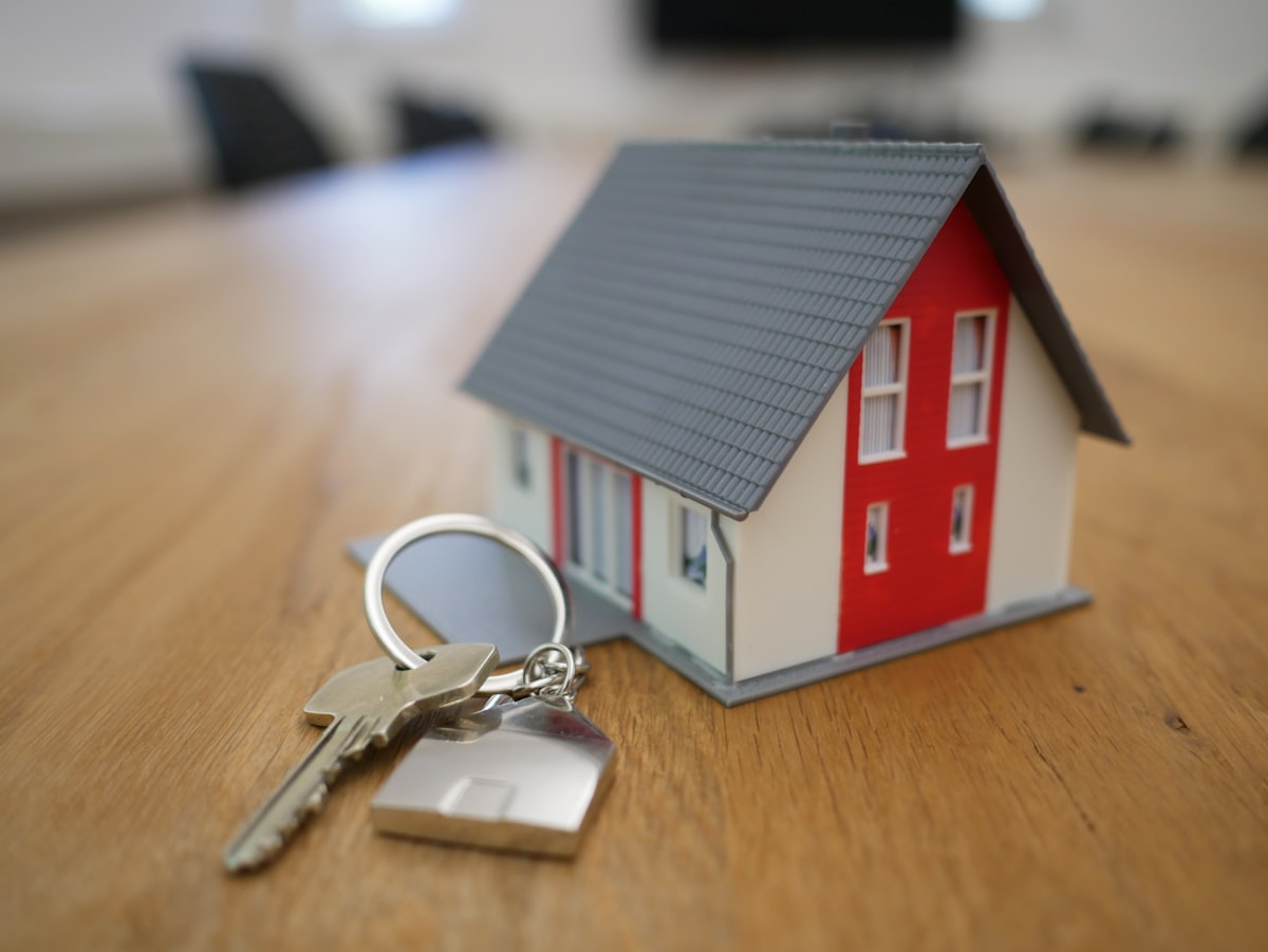 Lease documents and keys for a furnished rental