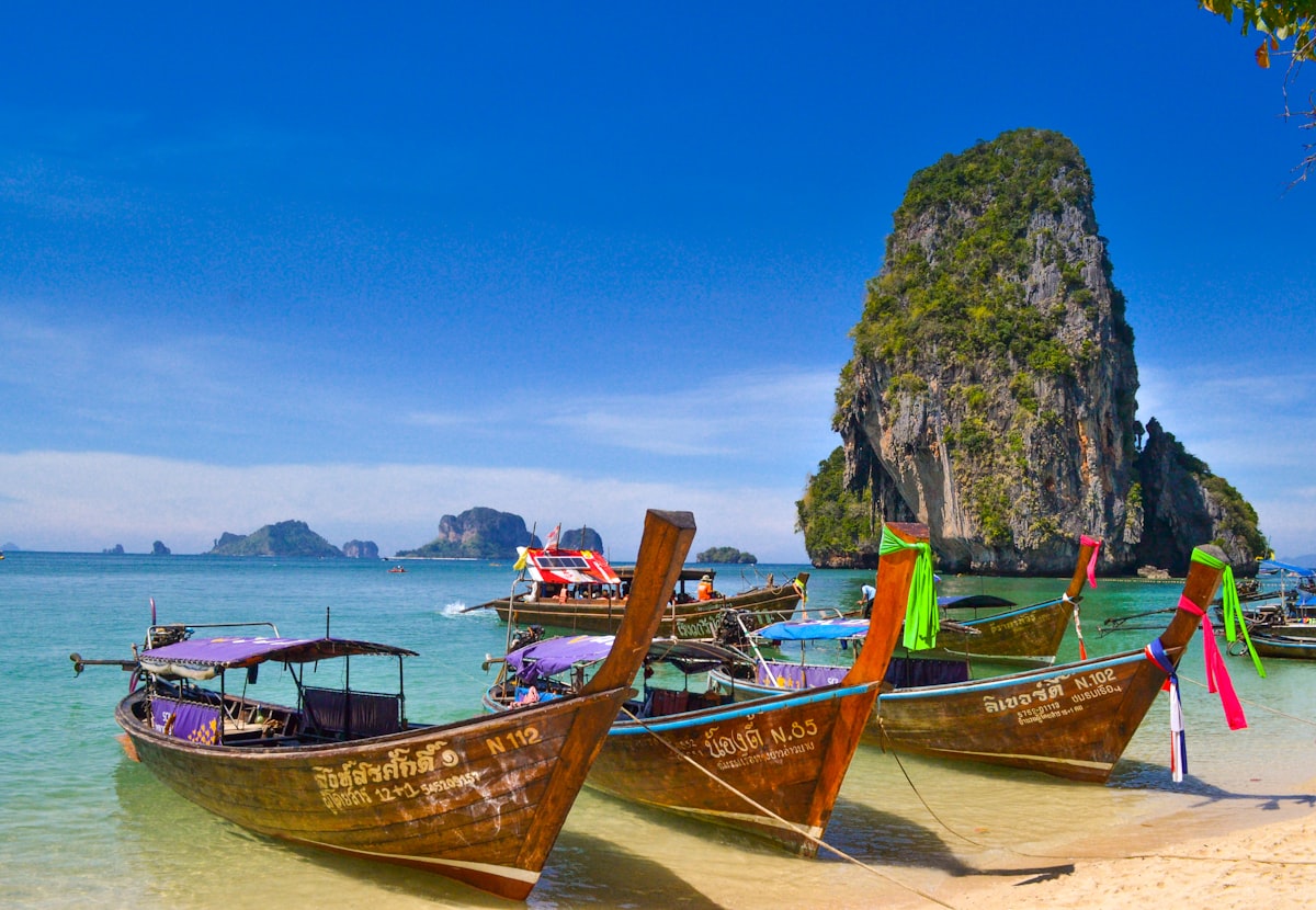 Floating market in Thailand with boats and colorful produce