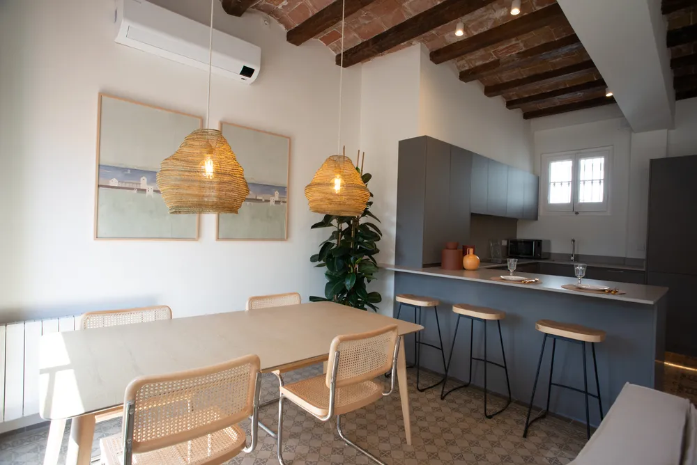 Refined Sky Residence With Expansive Workstation In Barcelona's Laietana District