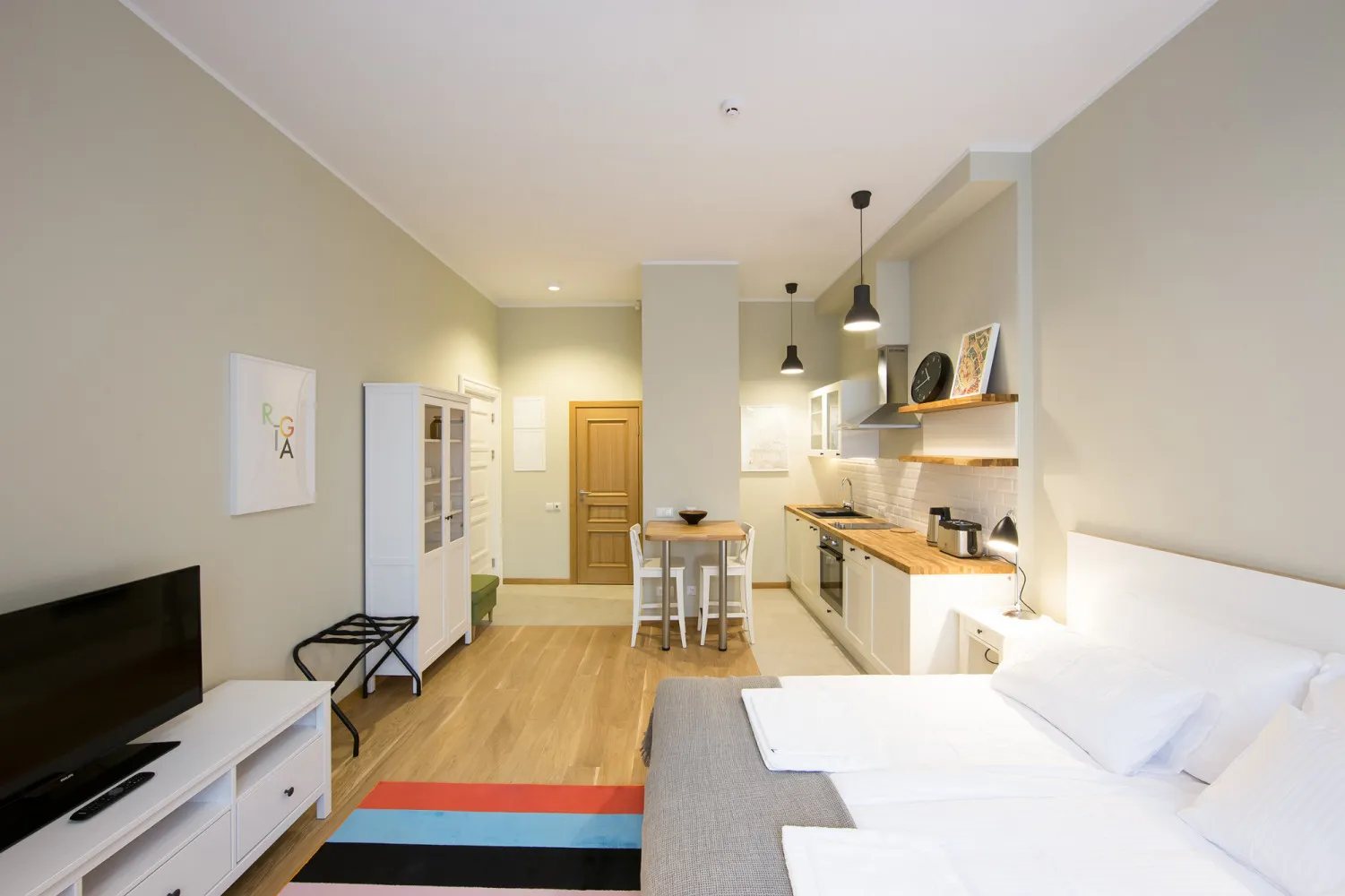 Sleek Open-plan Studio Flat In Riga - Compact Living With Work-from-home Setup #3